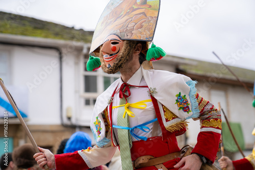Galician Felos wearing traditional costumes in the Entroido Folkloric Carnival in the streets of a Galician Village