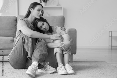 Young woman supporting her ...
