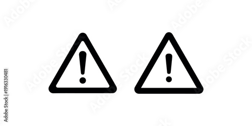 Pair of bold warning alert triangle signs with exclamation point inside indicating caution danger or important notice symbol