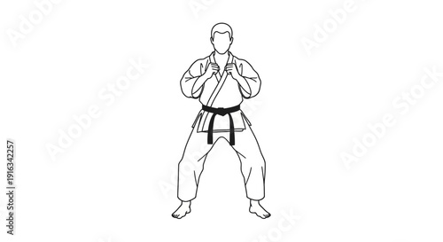 Karateka in a fighting stance, black belt, traditional uniform, martial arts training, combat readiness