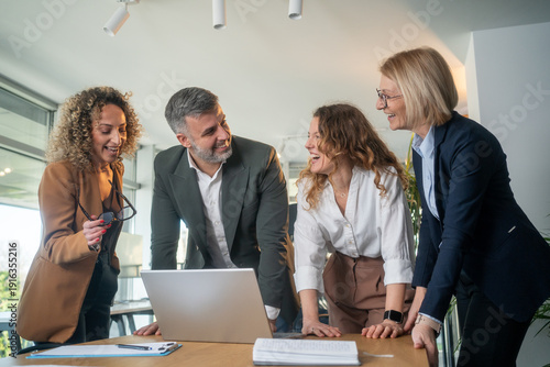 Tableau sur toile Diverse business team having meeting in office with positive collaborative atmos