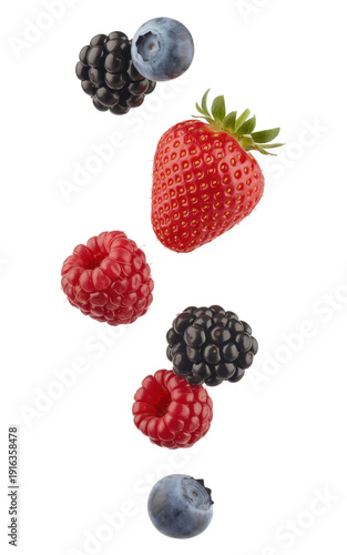 Assorted colorful berries floating strawberry blueberry isolated on a transparent background