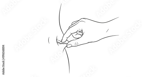 Close-up of a hand gently cleaning a baby's ear with a cotton swab