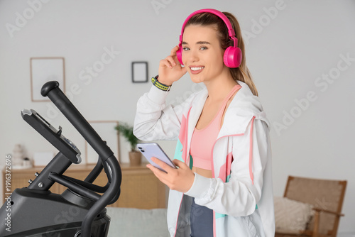 Sporty young woman with hea...
