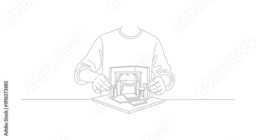 Artist's hands creating a miniature pop-up scene, intricate paper craft detail