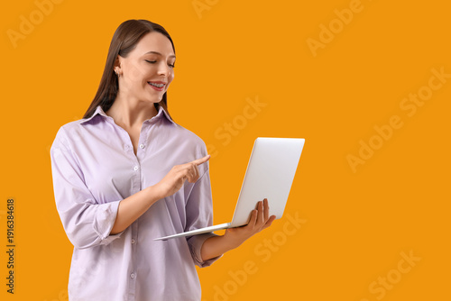Beautiful young woman with ...