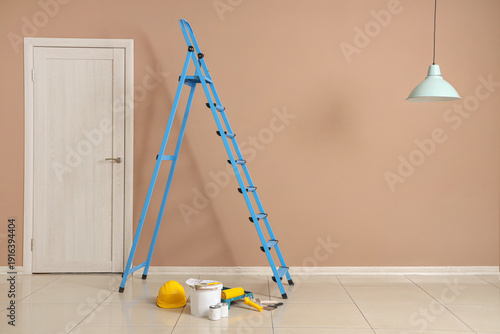 Stepladder with cans of pai...