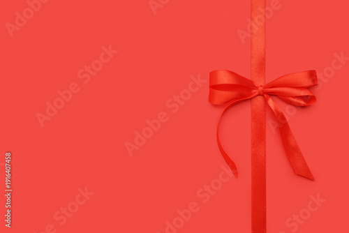 Bow made of satin ribbon on...