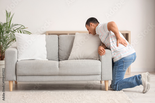 Young man suffering from ba...