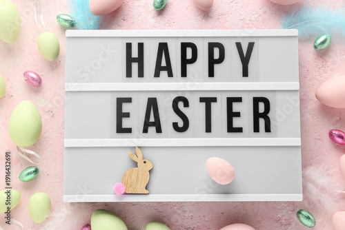 Board with text HAPPY EASTE...