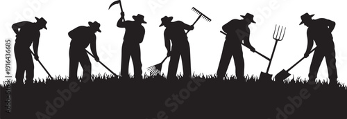 Silhouette of people working in a field with tools