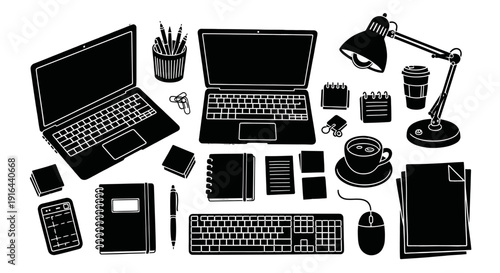 Overhead view of a cluttered workspace with laptops, notebooks, pens, coffee, and office accessories