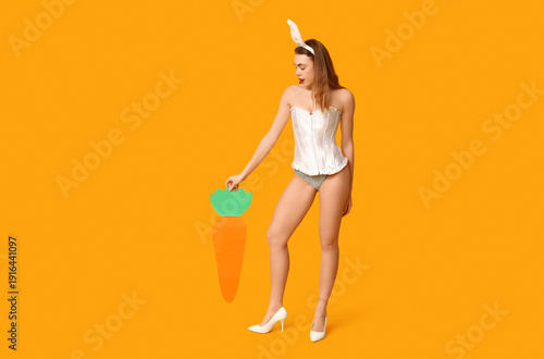 Sexy young woman in bunny e...