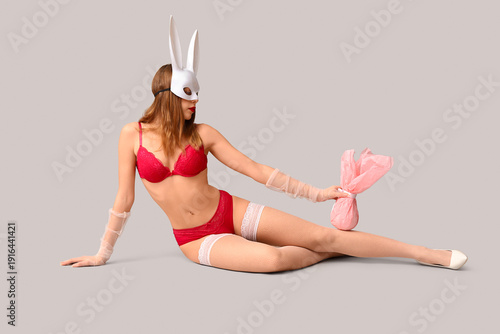 Sexy young woman in bunny m...