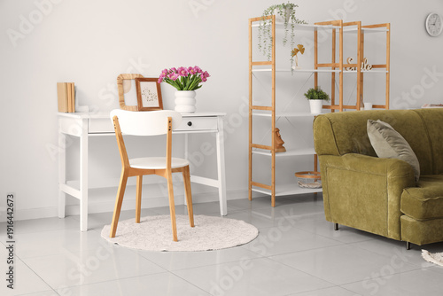 Vase with tulips on table i...