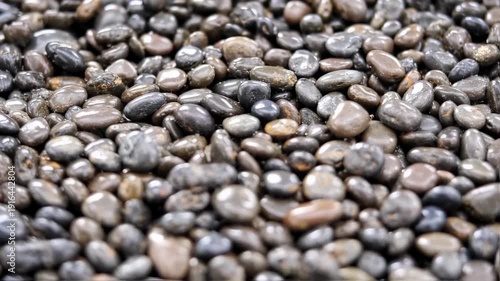 Smooth Stones - A Close-Up View of Polished River Rocks.