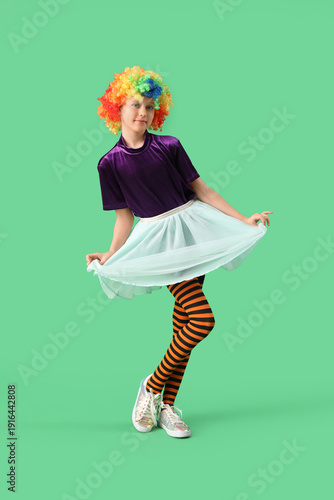 Funny girl in clown costume...