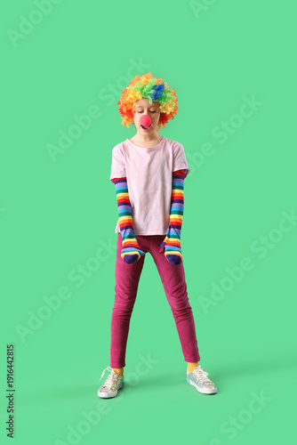 Funny girl in clown costume...