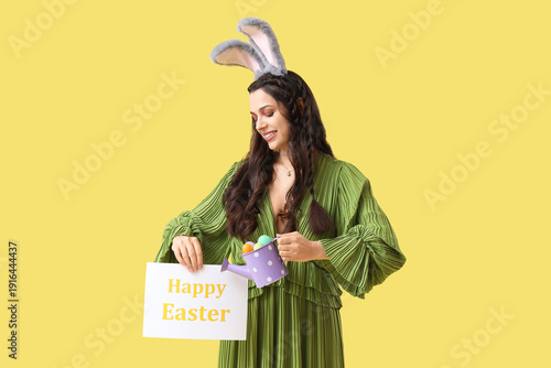 Beautiful woman in bunny ea...