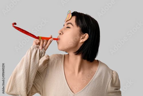 Beautiful young woman with ...
