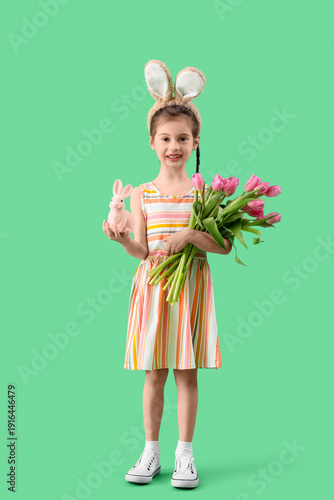 Cute little girl wearing bu...