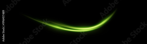 Glowing green neon light curve with elegant swirl motion and sparkling particles on dark background. Dynamic energy streak representing power and futuristic technology effect.