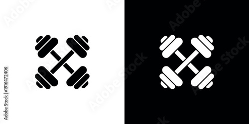 Black and white dumbbell on split background fitness