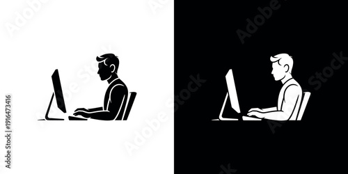Man sitting at computer in black and white