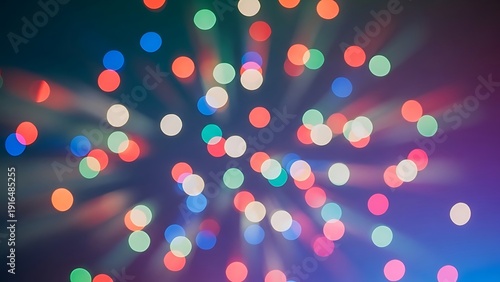 Multicolored bokeh lights on dark background with radial beams colorful lights