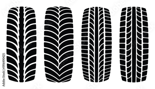 Four Different Tire Tread Patterns on White Background