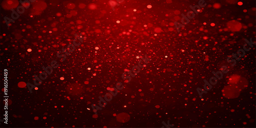 Red water drops glisten on a dark background featuring festive Christmas stars, glowing winter lights, and gold glitter for a sparkling holiday celebration design