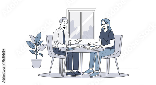 Man and woman sitting at office table.