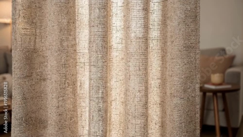 Medium shot showcasing heavyweight naturalfiber drapery with rich dense weave providing a sense of warmth and privacy in a cozy interior setting.