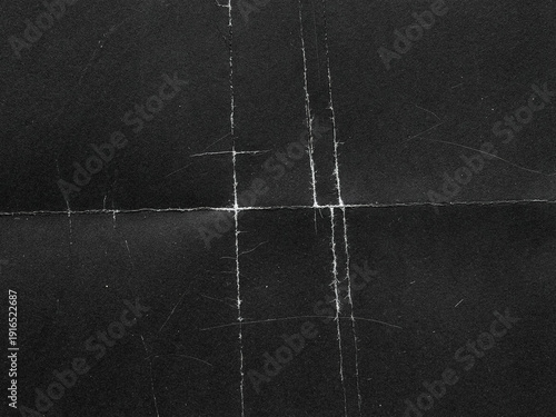 Gritty Folded Paper Texture Overlay. Distressed Creased Black Paper Background. Grunge Analog Scan Surface, Film  Texture