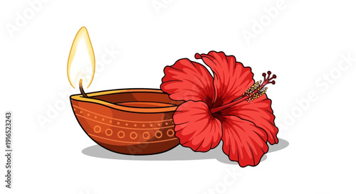 Diwali diya and red hibiscus flower decoration.