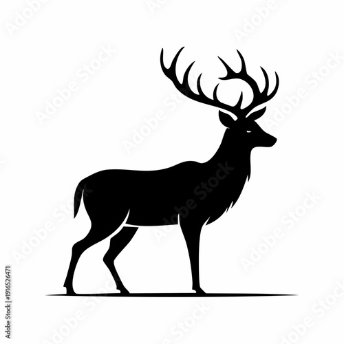 Black silhouette of a deer with large antlers standing on a white background with a minimalist style.