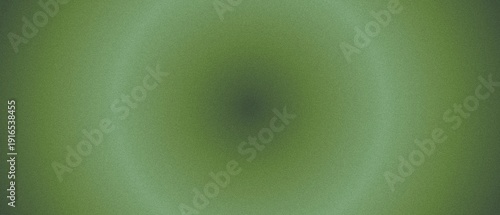 Soft circular green gradient abstract background with smooth blurred grain texture and subtle light center