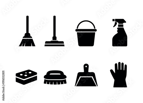 Home cleaning supplies: broom, mop, bucket, spray bottle, sponge, scrub brush, dustpan, rubber glove