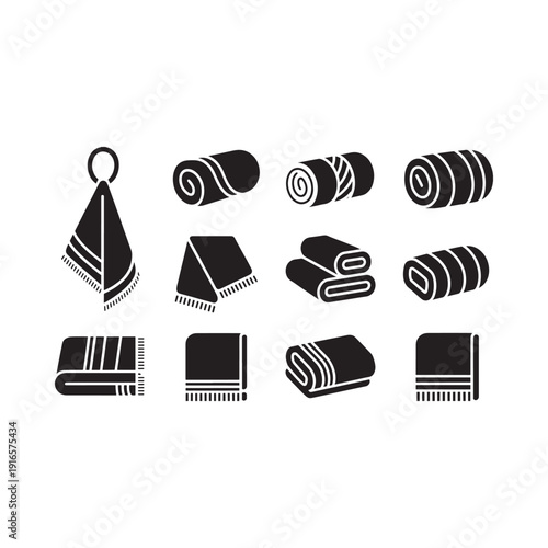 Black and white illustration of folded and hanging towels and blankets