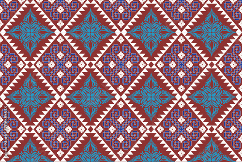 Bold geometric pattern inspired by traditional tribal artistry blended seamlessly with classic Thai textile motifs. The vibrant red background is enhanced by refined white and blue elements, creating 