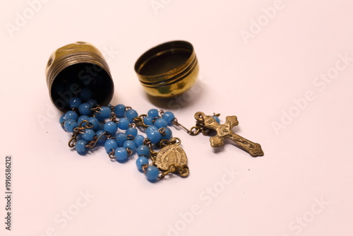 Dum Dum Bullet case repurposed to carry small set of Rosary Beads.