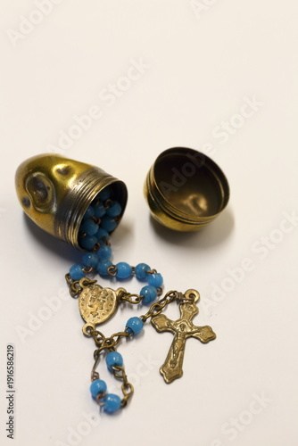 World War One Dum Dum Bullet Case repurposed to carry small set of Rosary Beads.