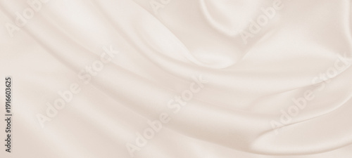 Smooth elegant golden silk or satin luxury cloth texture as wedding background. Luxurious background design. In Sepia toned. Retro style