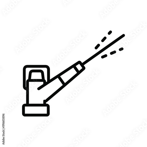 A spray nozzle emitting a fine mist of liquid particles into the air