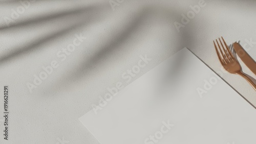 Soft shadow cast across a clean, minimalist paper surface with subtle textures