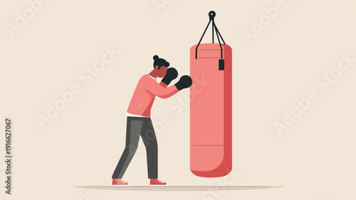 Boxer in red shirt and black gloves trains with a pink punching bag