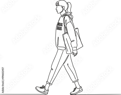 Young girl walking with backpack and books in hand school