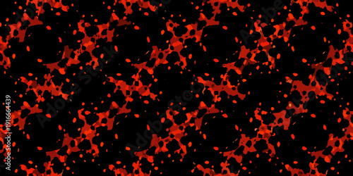 Abstract background with scattered irregular red shapes against black