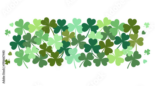 Vibrant row of green shamrocks and clovers in a festive St. Patrick's Day pattern for luck and greenery