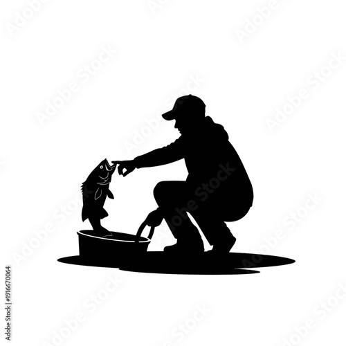 Silhouette of a fisherman with a fish he has just caught.